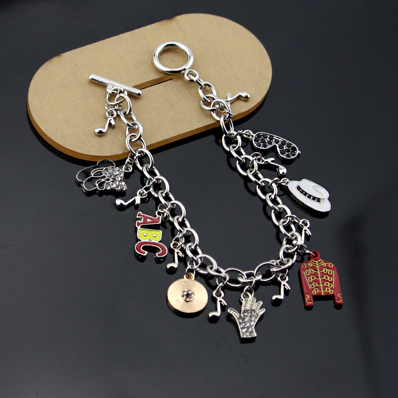 Gelang Pesona Musik Michael Ja - Musical Instrument Jewelry ulasan dan harga